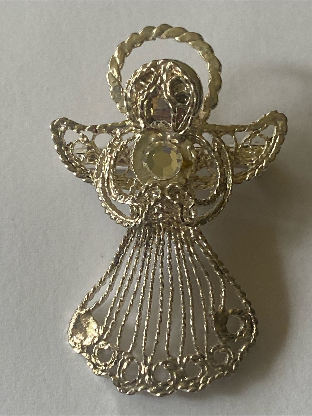 Silver tone vintage angel brooch